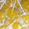 Flat Lollipops Yellow 1kg Bag 125pc 1 Flat Lollipops Yellow 1kg Bag 125pc -AU Candy Sales 2024 lollipops yellow